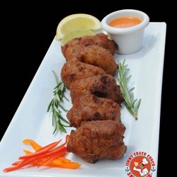 Jimmy Crack Conch Seafood - Delicious Conch Fritters with dipping sauce