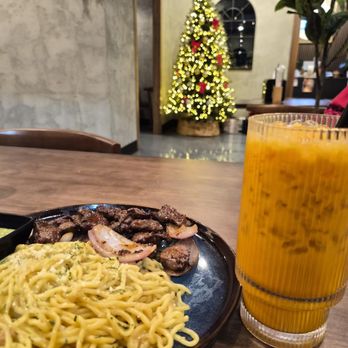 Sona Fusion Kitchen - House Garlic Noodles with filet Mignon and Thai Tea - Asian Fusion Near Me - Anaheim, California Sona Fusion Kitchen - House Garlic Noodles with filet Mignon and Thai Tea - Asian Fusion Near Me - Anaheim, California