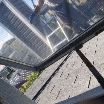 Quality 1st Maintenance - Oscar explaining roof gutter improvements - Chimney Sweeps Near Me