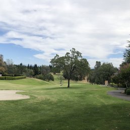 a view of a golf course a view of a golf course
