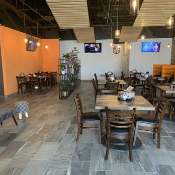 Exotic Sweets - Inside. To the left is the ice cream area (not in photo) and to the right additional tables not seen in photo. - Bubble Tea Near Me - Baton Rouge, Louisiana