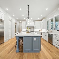 FFC  Fast Flooring - New kitchen. New cabinets. Quartz on top. Fresh painted finish. And a brand-new floor to complete the transformation