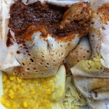 Ethiopian Restaurant - Chicken wot and side goodies - Ethiopian Near Me - Denver, Colorado Ethiopian Restaurant - Chicken wot and side goodies - Ethiopian Near Me - Denver, Colorado