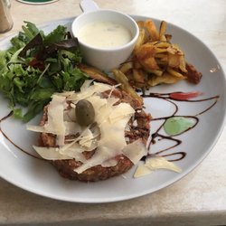Amici Ristorante Italiano - Italian tartar with potatos, salad and cheese sauce.