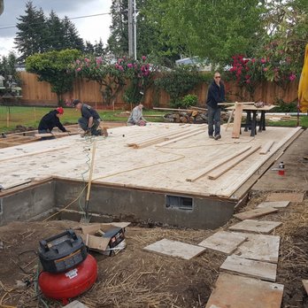 Cravenho Construction & Building - workers working on a deck - General Contractors Near Me