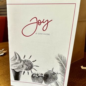 Joy by Seven Reasons - Dessert menu- we ordered the Coconut Flan. - Latin American Near Me - Chevy Chase, Maryland Joy by Seven Reasons - Dessert menu- we ordered the Coconut Flan. - Latin American Near Me - Chevy Chase, Maryland