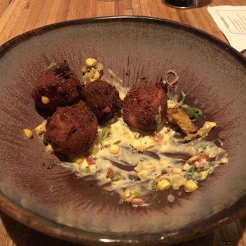 Husk - Fried Corn Fritters, Heritage Pork, Sweet Corn Relish, Pickled Peppers, Basil $11 - American Near Me - Charleston, South Carolina Husk - Fried Corn Fritters, Heritage Pork, Sweet Corn Relish, Pickled Peppers, Basil $11 - American Near Me - Charleston, South Carolina