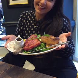 Picture of my friend Hala - who deserves kale more than I do - with her ham hock roast.