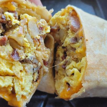 Cranky Al's - Bacon, egg, cheese, and potato burrito (the chorizo burrito with bacon instead of chorizo) - Coffee & Tea Near Me - Wauwatosa, Wisconsin Cranky Al's - Bacon, egg, cheese, and potato burrito (the chorizo burrito with bacon instead of chorizo) - Coffee & Tea Near Me - Wauwatosa, Wisconsin