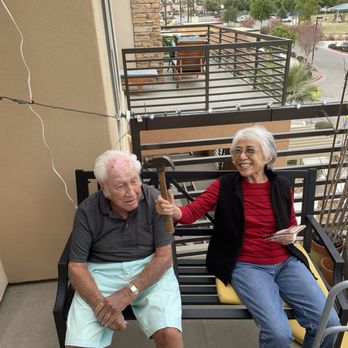 The Palms at La Quinta Assisted Living and Memory Care - Yoshie and Trev on the Balcony. - Assisted Living Facilities Near Me - La Quinta, California