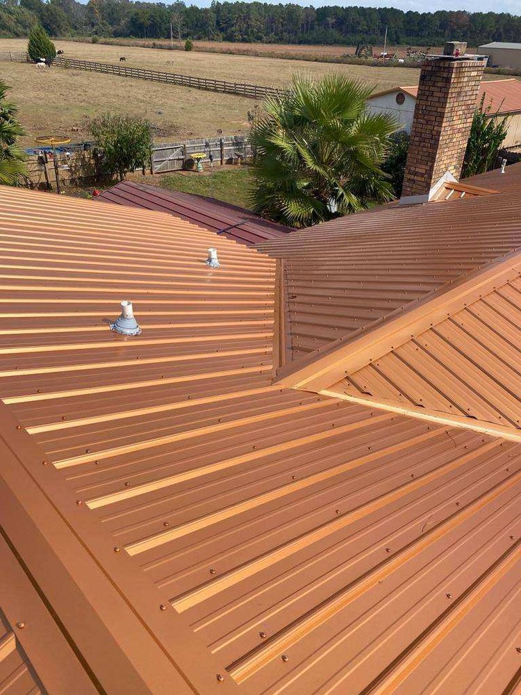 Slide of The Roof Company of NWFL