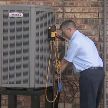 Lightning Service - Technician servicing a customer's home ac unit. - Electricians Near Me - Metairie, Louisiana Lightning Service - Technician servicing a customer's home ac unit. - Electricians Near Me - Metairie, Louisiana