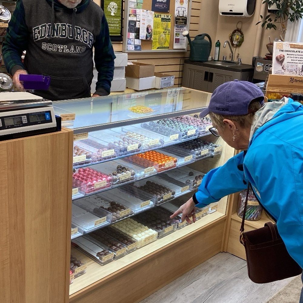 Merkaba Sol & The Chocolate Shoppe - Choosing truffles - Spiritual Shop Near Me - Augusta, Maine Merkaba Sol & The Chocolate Shoppe - Choosing truffles - Spiritual Shop Near Me - Augusta, Maine
