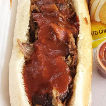 Shorty's Bar Be Cue - Well dressed chopped brisket sandwich. - Barbeque Near Me - Moriarty, New Mexico