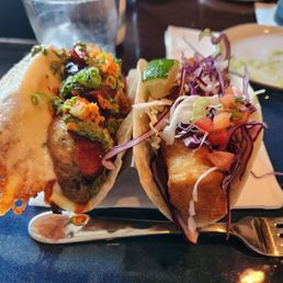Fish taco (right) and potato and chorizo taco (left)