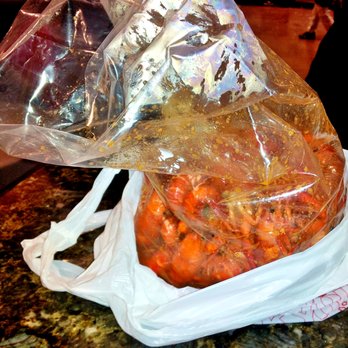 Bon Crawfish Hut - two bags of cooked food - Seafood Near Me - Grand Prairie, Texas