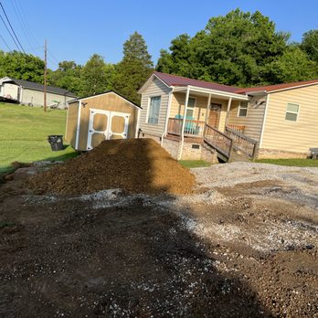 Walkers Lawn Care - a pile of dirt in front of a house - Lawn Services Near Me Walkers Lawn Care - a pile of dirt in front of a house - Lawn Services Near Me