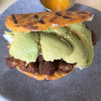 Arepas Coffee & Bar - One with pork Arepas - Coffee & Tea Near Me - Starkville, Mississippi Arepas Coffee & Bar - One with pork Arepas - Coffee & Tea Near Me - Starkville, Mississippi