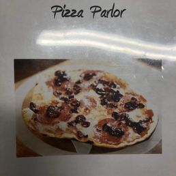 a pizza on a white plate a pizza on a white plate