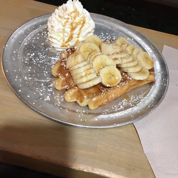 Zinneken's - Harvard Square - Banana, caramel and Whipped Cream on a soft waffle - Belgian Near Me - Cambridge, Massachusetts Zinneken's - Harvard Square - Banana, caramel and Whipped Cream on a soft waffle - Belgian Near Me - Cambridge, Massachusetts