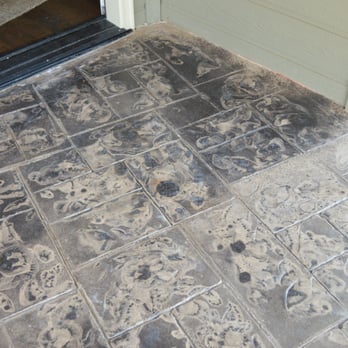 Lenz Custom Concrete - excess antiquing release over a brown patio - General Contractors Near Me - Caldwell, Idaho