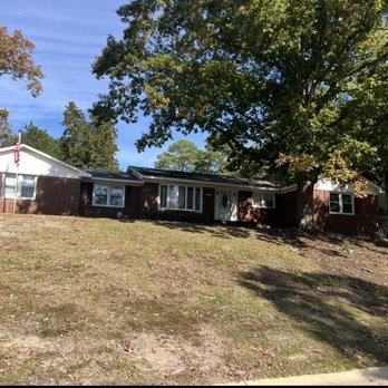Classic Tree Specialist - Before picture with the 2 huge oak trees - Tree Services Near Me