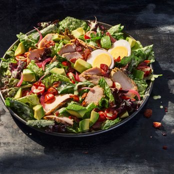 Panera Bread - a bowl of salad on a table - Salad Near Me - Kingston, Ontario