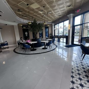 Port Coffee - Another area with this gorgeous decor and peaceful tree - Desserts Near Me - Harvey, Louisiana