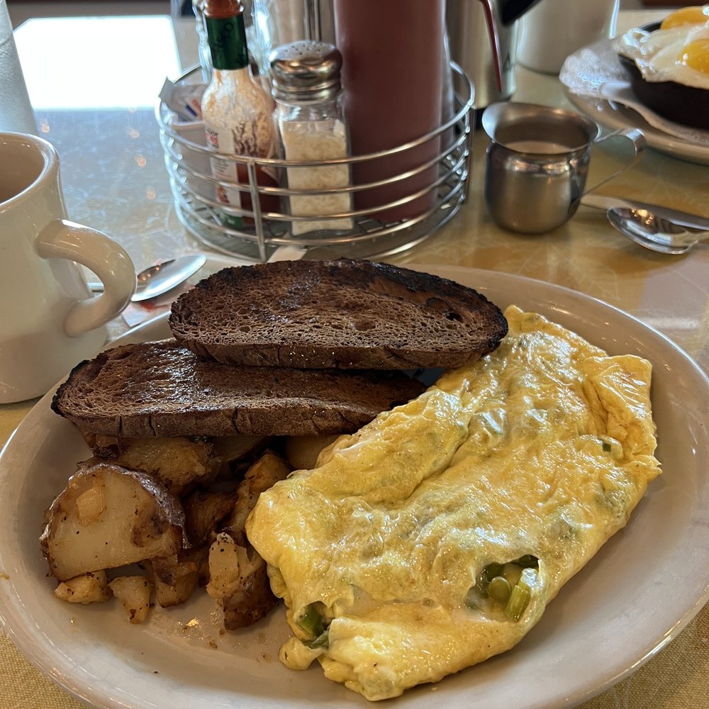 The Cooked Goose - Omelet with Fontina Cheese and Asparagus, along with home fries and pumpernickel toast. - Breakfast & Brunch Near Me - Westerly, Rhode Island