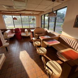 Wilson Pizza Palace - Seating in front