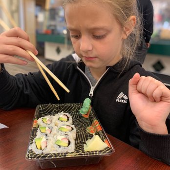Jade Express - She wasn't happy about the wasabi but enjoyed her Philly crab roll - Japanese Near Me - Asheboro, North Carolina