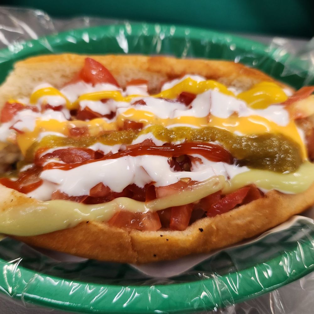 El Sabroso Hot Dog - a hot dog with ketchup and mustard - Hot Dogs Near Me - Phoenix, Arizona El Sabroso Hot Dog - a hot dog with ketchup and mustard - Hot Dogs Near Me - Phoenix, Arizona