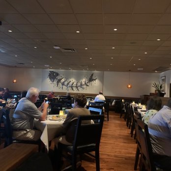 Bonefish Grill - people sitting at tables in a restaurant - Seafood Near Me - Tallahassee, Florida Bonefish Grill - people sitting at tables in a restaurant - Seafood Near Me - Tallahassee, Florida