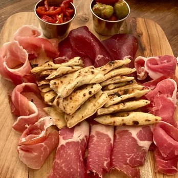 Dellarocco's - Prosciutto on a charcuterie board!! - Pizza Near Me - Brooklyn, New York