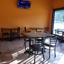 tables and chairs in a restaurant tables and chairs in a restaurant