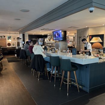 Earls Kitchen + Bar - Bar counter~ - Canadian (New) Near Me - Vancouver, British Columbia Earls Kitchen + Bar - Bar counter~ - Canadian (New) Near Me - Vancouver, British Columbia
