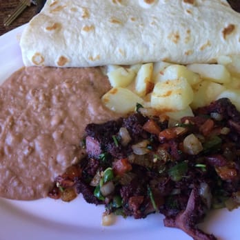 Nadines Mexican Restaurant - Morcilla plate with a chicharron guisado taco! - Mexican Near Me - San Antonio, Texas Nadines Mexican Restaurant - Morcilla plate with a chicharron guisado taco! - Mexican Near Me - San Antonio, Texas