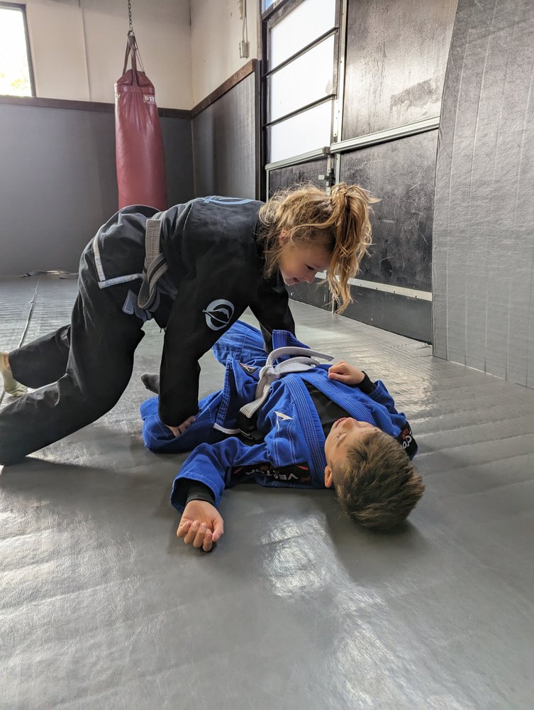 The Training Mat Logo