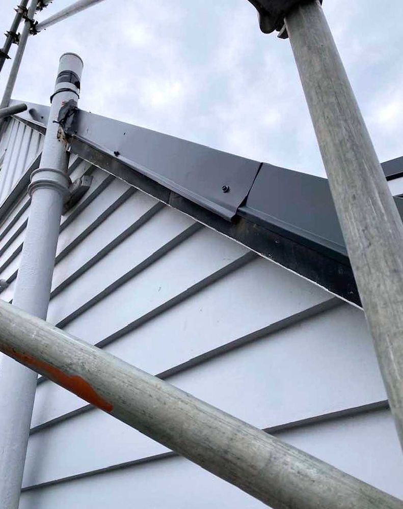 Slide of Liberty City Roofing