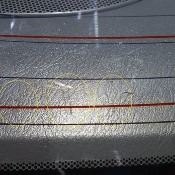 Ultra Window Tint - See circled area for damage -Rear speaker deck - Auto Glass Services Near Me - Santa Ana, California Ultra Window Tint - See circled area for damage -Rear speaker deck - Auto Glass Services Near Me - Santa Ana, California