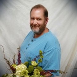 Midway Florist - Rob and a wedding design.