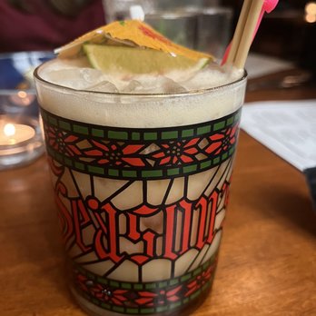Winfield's Pub - a glass of beer with a lime wedge - American Near Me - Buffalo, New York