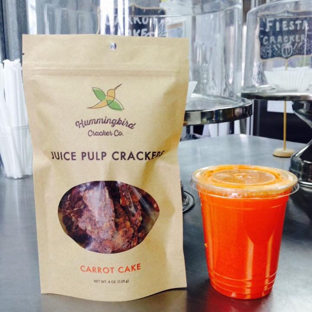 Hummingbird Cracker Co. - a bag of juice and a cup of carrot cake - Bakeries Near Me - Nashville, Tennessee Hummingbird Cracker Co. - a bag of juice and a cup of carrot cake - Bakeries Near Me - Nashville, Tennessee