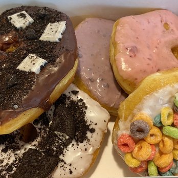 O Donuts - Variety of donuts - my favorites were the strawberry and blueberry glazed donuts (the top right two)!! - Donuts Near Me - Everett, Washington