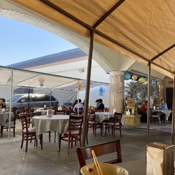 Hak Heang Restaurant - tables and chairs under a tent - Cambodian Near Me - Long Beach, California Hak Heang Restaurant - tables and chairs under a tent - Cambodian Near Me - Long Beach, California