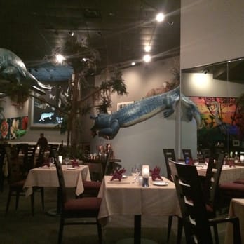 Everglades Restaurant - Everglades themed, with life size manatee, florida Panther, roseate spoonbills, herons and large beautiful salt water reef fish. - Seafood Near Me - Orlando, Florida Everglades Restaurant - Everglades themed, with life size manatee, florida Panther, roseate spoonbills, herons and large beautiful salt water reef fish. - Seafood Near Me - Orlando, Florida