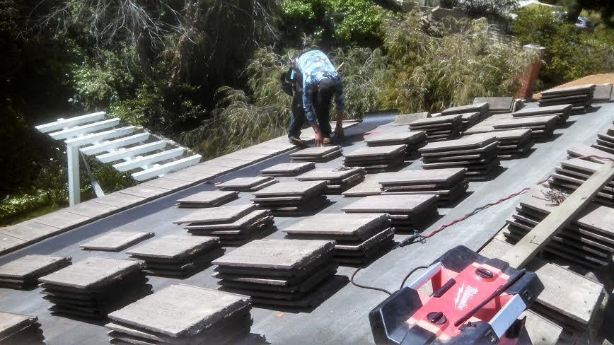 Slide of Wolfe Roofing Company