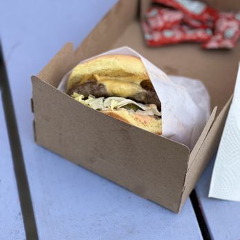 Rippers - a sandwich in a box on a picnic table - Beer, Wine & Spirits Near Me - Far Rockaway, New York Rippers - a sandwich in a box on a picnic table - Beer, Wine & Spirits Near Me - Far Rockaway, New York