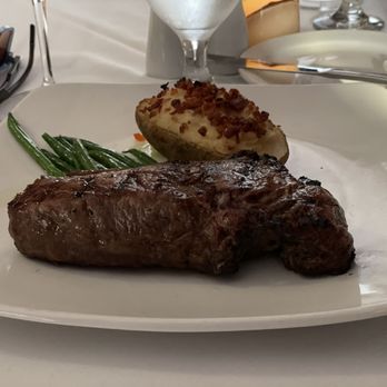 Nemo Grille - Strip steak was cooked perfectly. Twice baked potato. - New American Near Me - Avon, Ohio