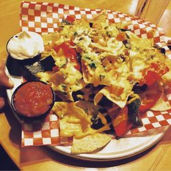 Chuck's Roadhouse - Nachos, smaller then before, and does not use real cheese. Would not recommend